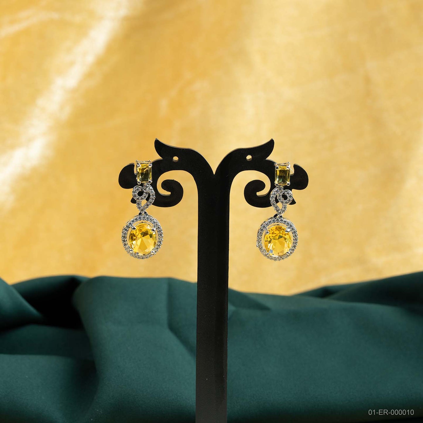 Nyra Silver Plated AD Golden Teardrop Drop Earrings